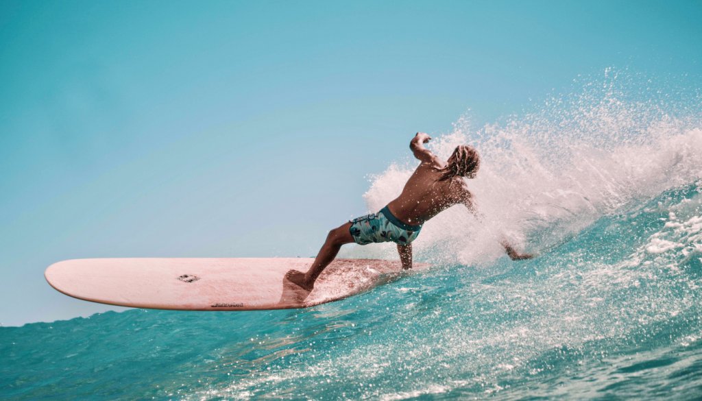 A surfer surfing with a positive mind